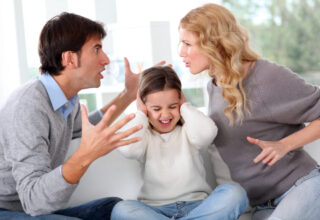 Parents arguing in front of their child, showing how arguments shape children