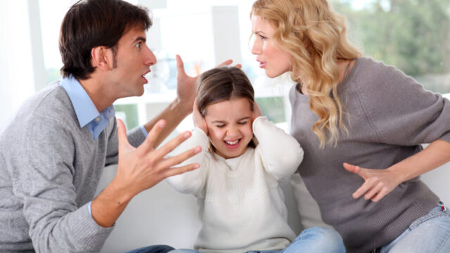 Parents arguing in front of their child, showing how arguments shape children