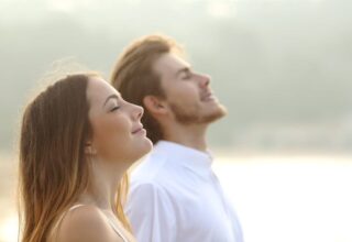Couple breathing fresh air outdoors, a personal development practice