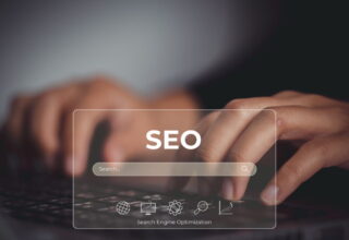 SEO concept with search engine optimization elements over a laptop